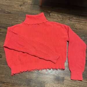 Hot pinkish-red cropped distressed sweater. Size L, fits like a M. Like new!